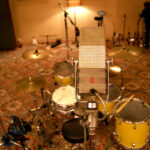 A gorgeous RCA ribbon mic hovering above the Rogers drumkit.
